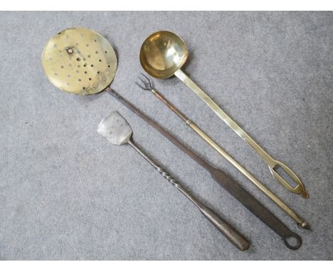 An 18th Century brass and iron skimmer and five tools including toasting fork (4)