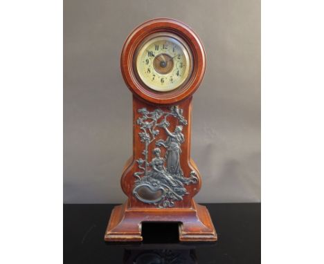 A circa 1900 Art Nouveau mantel clock with pewter plaque depicting maidens, birds and blossom, 33.5cm tall