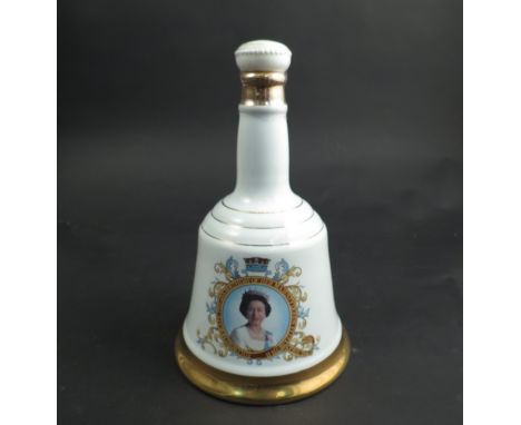 Bells Scotch Whisky Commemorative porcelain decanter "The 60th Birthday of Her Majesty Queen Elizabeth II" with contents