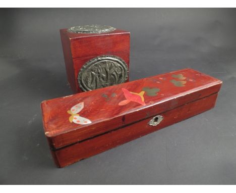 An Oriental red lacquered tea caddy with pewter mounts and a jewellery box (2)