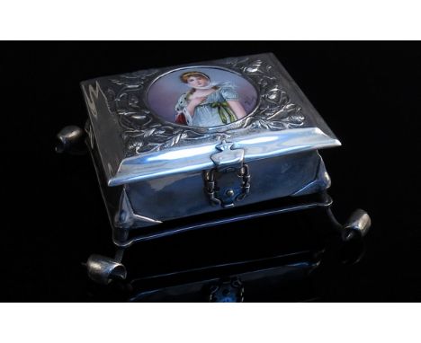 A William Hair Haseler silver box of Arts & Crafts & Nouveau form, the embossed portrait panel signed Volney, raised on outsw