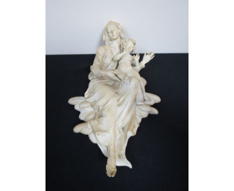 A Capodimonte ceramic wall hanging figure of Madonna & Child.  Signed Pellati.  34cm tall 