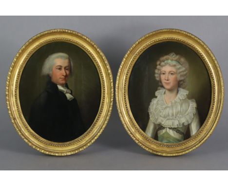ENGLISH SCHOOL, late 18th/early 19th century.  A pair of male &amp; female portrait studies, she with blue ribbon in her curl