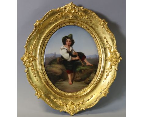 A BERLIN PORCELAIN OVAL PLAQUE, finely painted with a Tyrolean pipe player in a mountainous landscape with ruins, 11” x 8¾”, 