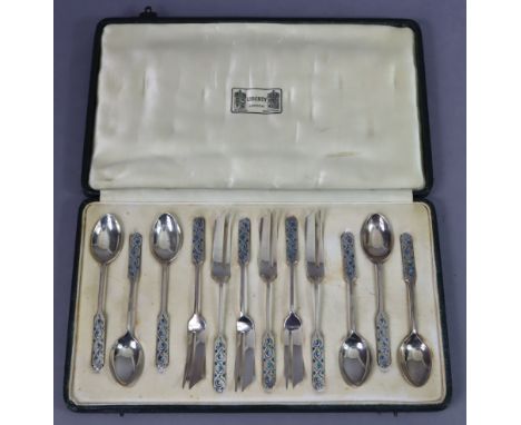 A set of six Liberty &amp; Co. Silver &amp; enamel coffee spoons &amp; six matching cake forks, the elongated terminals with 