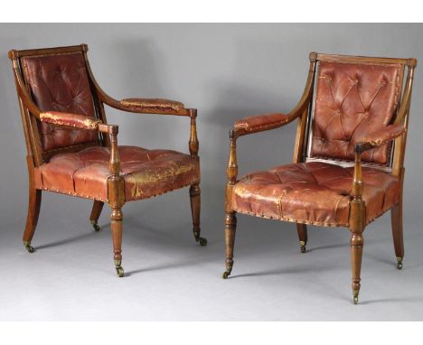 A PAIR OF REGENCY LIBRARY ARMCHAIRS, the beech frames with turned supports, each having removable back, open arms, &amp; padd