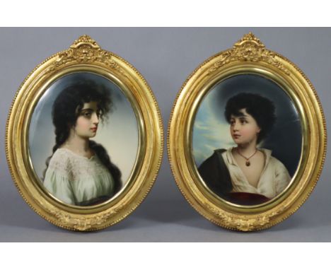 A PAIR OF CONTINENTAL PORCELAIN OVAL PLAQUES, each with portrait of a young lady, one with long curled hair, the other with a
