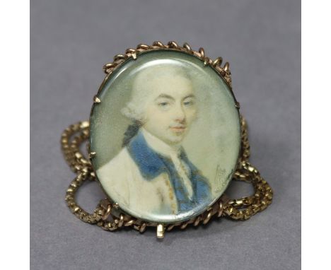 A late 18th century portrait miniature of a gentleman wearing white coat with blue collar &amp; white stock, powdered wig en-