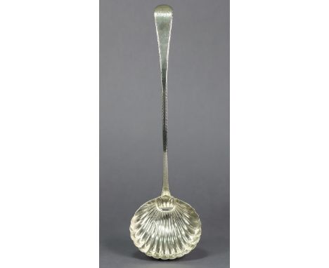 A George III silver Old English soup ladle with bright-cut edge &amp; oval fluted bowl, 13” long; London 1776, by George Smit