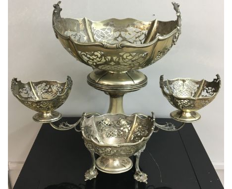 19 th C Silver plated Epergne with five filigree baskets set on floral scroll arms with large central column supporting the l