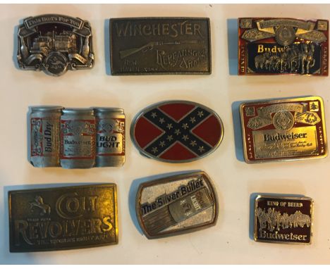 Vintage belt buckles, Winchester, Colt and Budweiser.