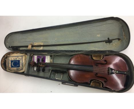 Vintage wooden cased violin and bow. back measures 14".