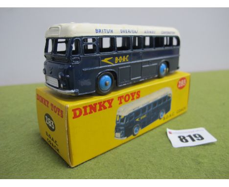 A Boxed Dinky Toys #283 B.O.A.C Coach, dark blue body, off white roof (age related marks), pen writing to box.