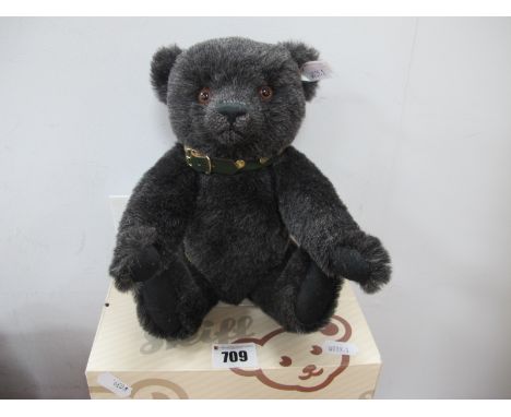 A Steiff Teddy Bear, Jack - The Rare Black Alpaca Bear, green collar, Danbury Mint exclusive, 26cm high, accompanied by certi