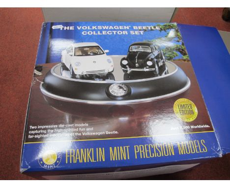 A Franklin Mint 1:24th Scale the Volkswagen Beetle Collector Set, (two models), with display plinth, literature, boxed.