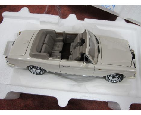 A Franklin Mint 1:24th Scale Diecast Model 1992 Rolls Royce Corniche IV, with tag, no literature, boxed.