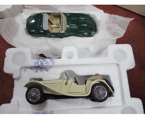 Two Franklin Mint 1:24th Scale Diecast Model Jaguars, 1961 E-Type, 1938 SS-100, both with tags, boxed.