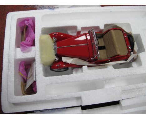A Franklin Mint 1:24th Scale Diecast Model 1948 MGTC, with tag, boxed.