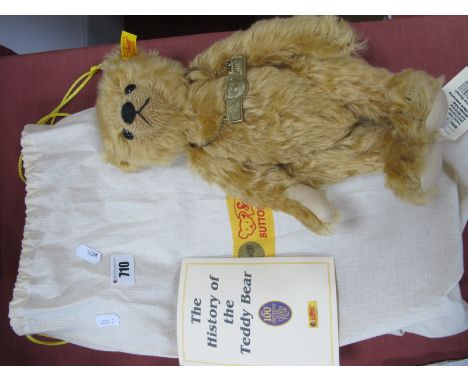 A Steiff Teddy Bear, #660337 The Steiff Centenary Bear, mohair, growler, approximately 30cm high, certified No 0032, presente