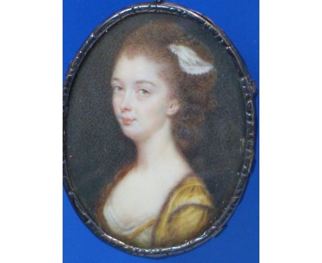 18th.C.ENGLISH SCHOOL.  OVAL MINIATURE PORTRAIT OF A LADY, WHITE METAL ENCLOSED FRAME  5 x 4cms.