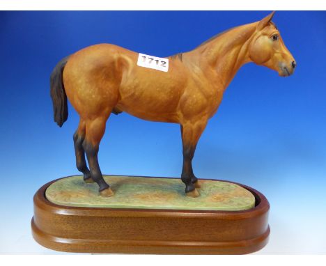 A 1962 ROYAL WORCESTER FIGURE OF AN AMERICAN REGISTERED QUARTER HORSE MODELLED BY DORIS LINDNER.   W 26cms.