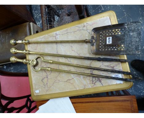 A SET OF VICTORIAN BRASS FIRE TOOLS, THE POKER   L.67cms.
