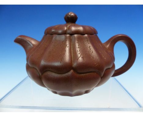 A YIXING TEA POT, TWO OTHERS  CHINESE AND AN ENGLISH TREACLE WARE TEA POT, THREE CHINESE BLUE AND WHITE VASES, THE TALLEST.  