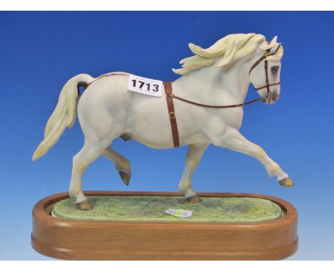 A 1966 ROYAL WORCESTER FIGURE OF THE WELSH MOUNTAIN PONY COED COCH PLANED MODELLED BY DORIS LINDNER.   W 25.5cms.
