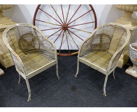 TWO VINTAGE PAINTED IRON FAUX BAMBOO GARDEN ARMCHAIRS.