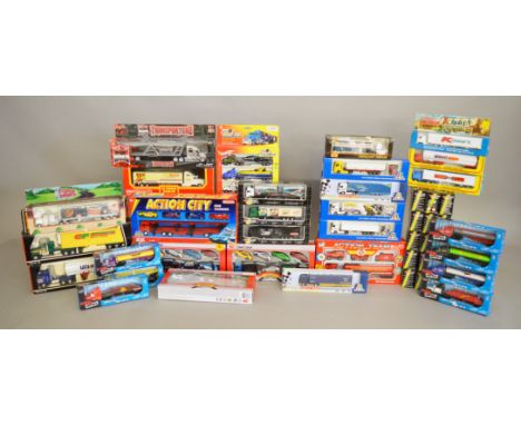 40 boxed diecast model trucks by Maisto, Dickie and others in various different scales together with five boxed Italeri truck