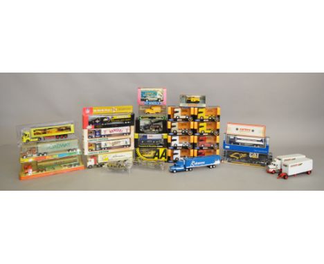 24 boxed diecast model trucks by 'Playart', 'Snap-On' and others, in a variety of different scales, including 8 Scania V8 R73