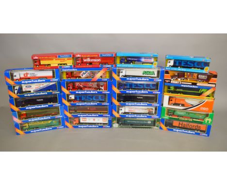 24 boxed Corgi diecast model 1:64 scale trucks, in various different liveries, from the 'Superhaulers' range, including Asda,