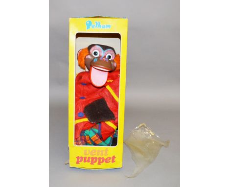 A boxed Pelham 'Vent Puppet' - Monkey, appears G but somewhat dusty in F box with damage to plastic box window.