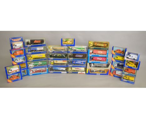 18 boxed diecast trucks by Corgi plus 16 van and truck models, which includes; 58203, 91830, 58204 etc (34).
