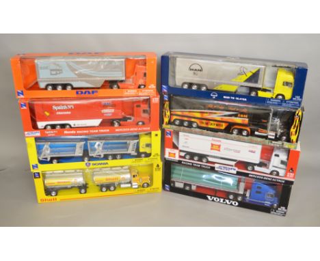 8 boxed NewRay diecast truck models in 1:32 scale, with MAN, Volvo, DAF and Scania, being amongst the marques represented, in