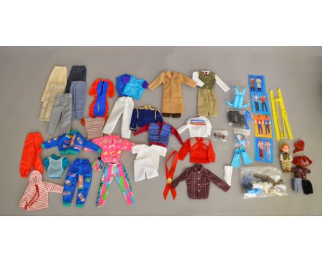 A good selection of vintage Ken doll clothing outfits, this lot also includes a Tommy doll (Ken's brother) by Mattel.