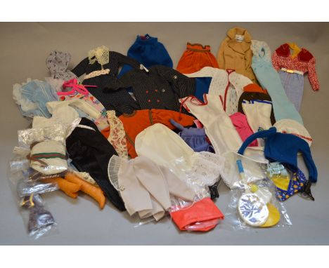 A good selection of vintage Barbie doll outfits which are all VG condition. 