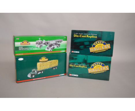 4 boxed 1:50 scale diecast lorries by Corgi, all part of the Heavy Haulers series. This lot includes; US24902, US50710, US514