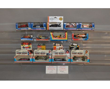 17 boxed diecast Racing Car models by ERTL, Gama, Tomica and others, in a variety of different scales, including a Faracars (