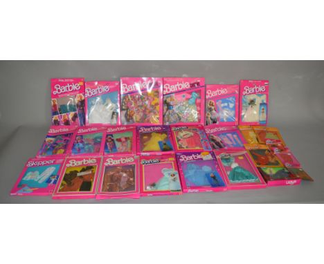 25 Barbie doll outfit sets by Mattel, which includes; Ken Ready to Wear, Skipper Fashion Fantasy, Barbie Dream Glow, Barbie S