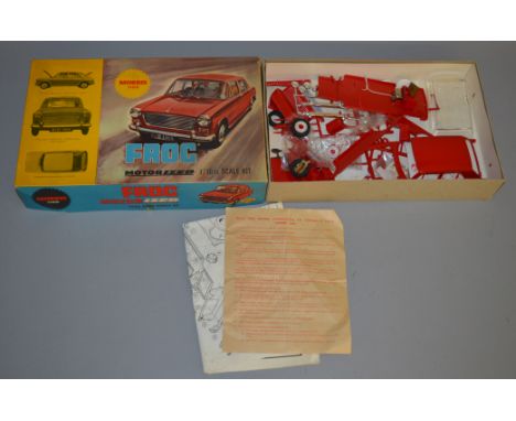 A boxed Frog Morris 1100 motorized plastic construction kit in 1:16 scale, with painting to some of the parts and many detach