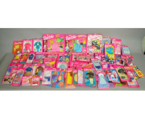 A mixed lot of over 50 Barbie doll items by Mattel, which includes; Ken Special Collection, Barbie Treasures 13760 etc access