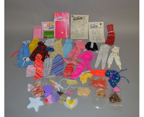 A good selection of vintage Barbie doll accessories and clothes.