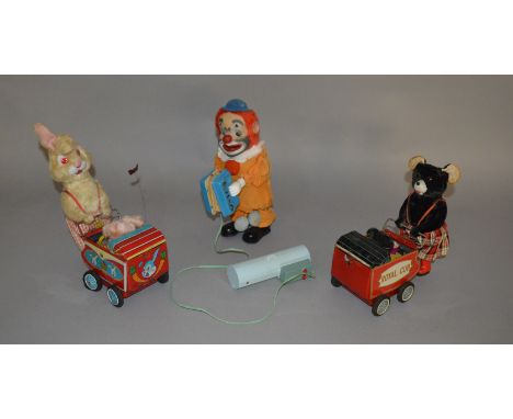 Three unboxed vintage Japanese battery operated tinplate toys including a Yonezawa (Japan)  Clown figure with Squeeze-box, to