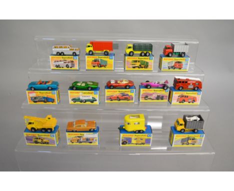 13 boxed  Matchbox 1-75 series 'Superfast' models, including  4 Stake Truck, 26,  34 Racing Car, 35 Fire Engine, 36 Draguar, 