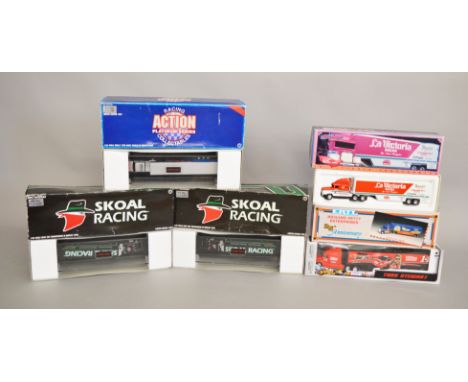 6 boxed motor racing related diecast model trucks in various scales by "White Rose", "ERTL" etc which includes three limited 