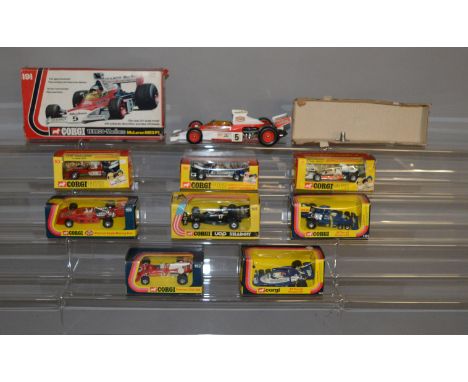 8 boxed vintage Corgi Toys diecast model Racing Cars, including 150 Surtees, 151, 152, 153 T.S.98 Team Surtees, 155 uop Shado