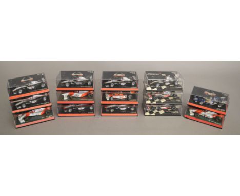 14 boxed Minichamps McLaren F1 Racing Car diecast models in 1:43 scale including Mercedes MP4/14 M Hakkinen, MP4/12 and MP4/1