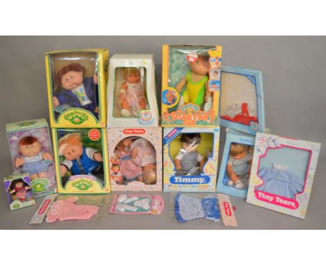 A mixed lot of dolls which includes, Cabbage Patch Kids, Cabbage Patch Kids Baby, Fisher Price Julie, Tiny Tears Timmy.