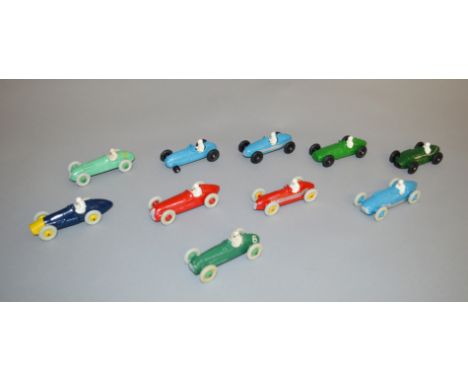 8 unboxed vintage diecast Racing Car models, four by Dinky and four by Crescent, all of which have been repainted. Two Dinky 